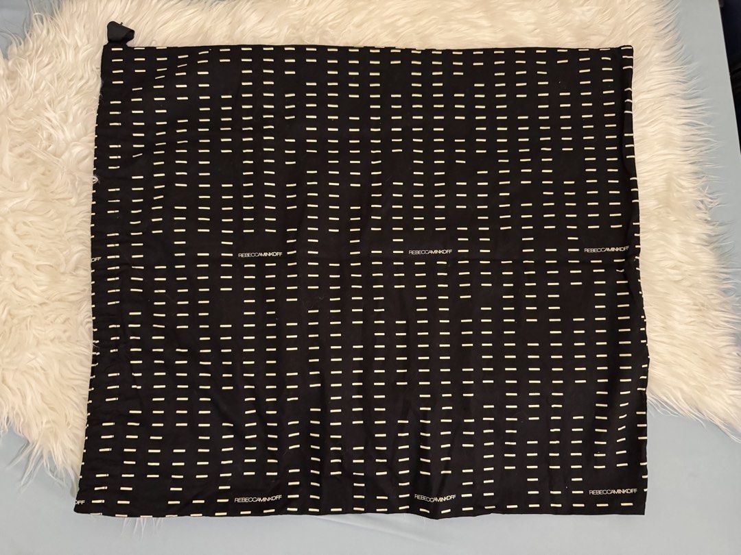 Rebecca Minkoff Dust Bag (Category: Luxury Accessories) located in Pasig City. Submitted by topbrandpursuits (Listing ID 1458563677, Image 1). Description: - Brand: Rebecca Minkoff - Color: Black with white dash pattern - Size: 23x19.5 inches .