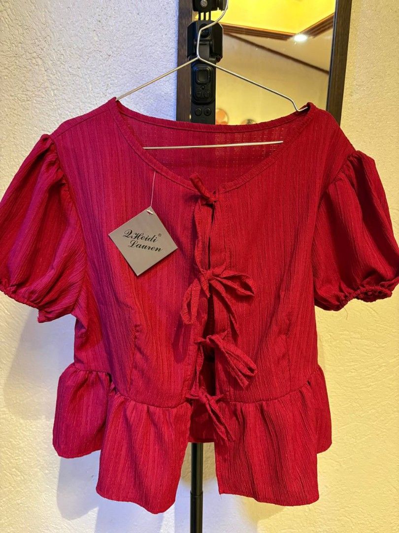Red Puff Sleeve Peplum Top (Category: Blouses) located in Dasmarinas. Submitted by freyjawinters (Listing ID 1458552143, Image 1). Description: New‼️ Bought for 250Php RFS: Wrong size Location: Dasma, Cavite.