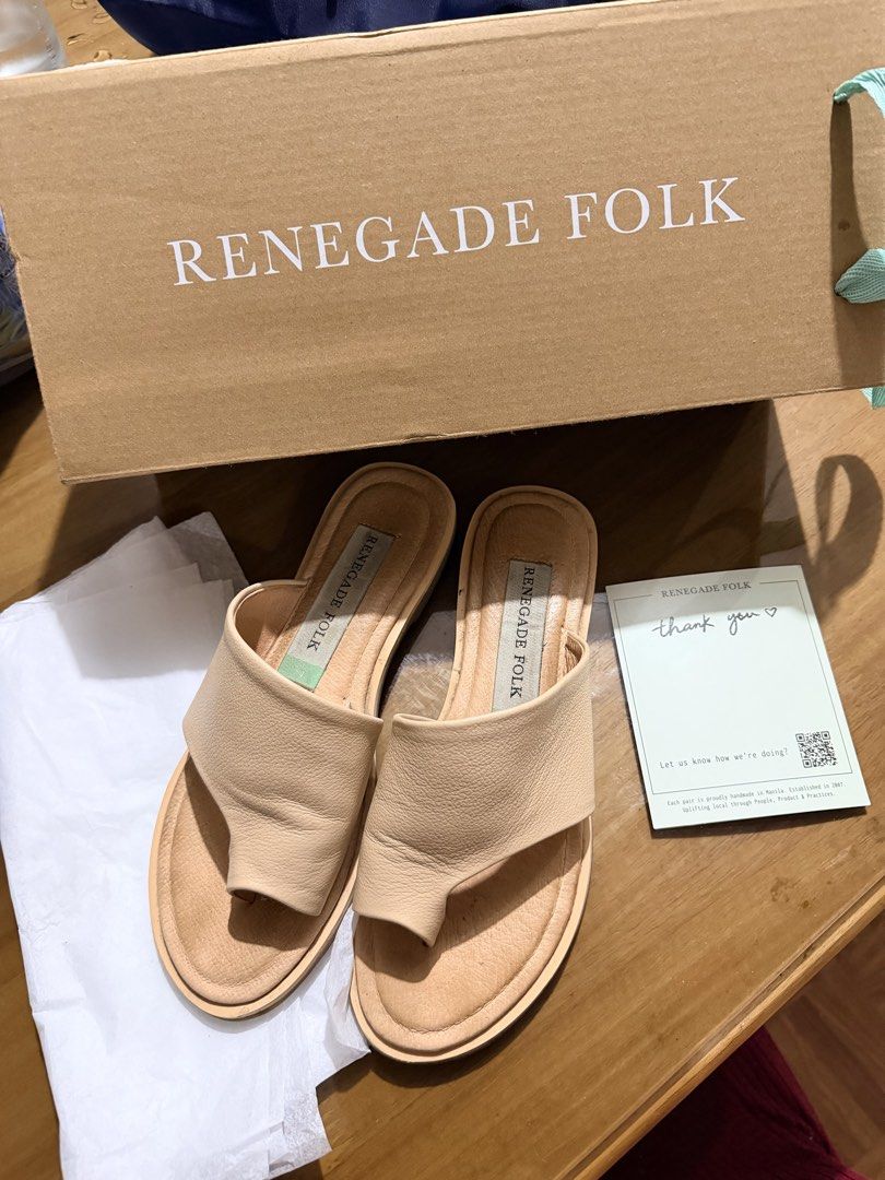 Renegade Folk Beige Leather flat (Category: Flats & Sandals) located in Makati City. Submitted by beymadrigal (Listing ID 1458625472, Image 3). Description: - Brand: Renegade Folk - Color: Beige - Material: Leather - Style: Thong Sandals - Closure: Slip-on - Condition: Great for casual wear - Includes: Original box and thank you card.
