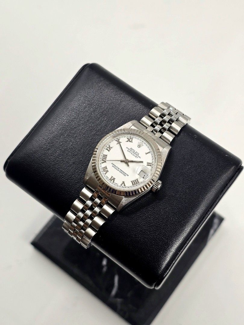 Rolex Datejust 31 Junior White Roman Dial (Category: Luxury Watches) located in Makati City. Submitted by jracastelar (Listing ID 1458574820, Image 1). Description: Rolex Datejust 31 78274 K serial (2002) No Lug Holes Watch, Box, and Manual (Lost Cert) 9/10 368,500.