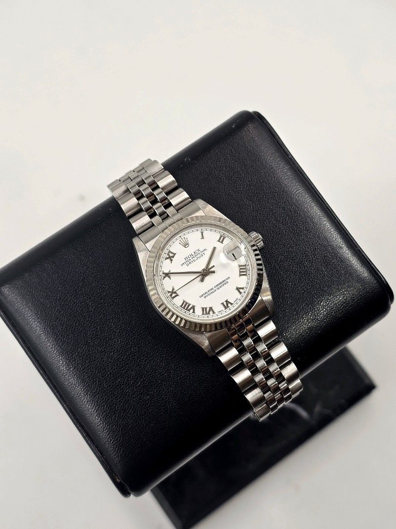 Rolex Datejust 31 Junior White Roman Dial (Category: Luxury Watches) located in Makati City. Submitted by jracastelar (Listing ID 1458574820, Image 3). Description: Rolex Datejust 31 78274 K serial (2002) No Lug Holes Watch, Box, and Manual (Lost Cert) 9/10 368,500.