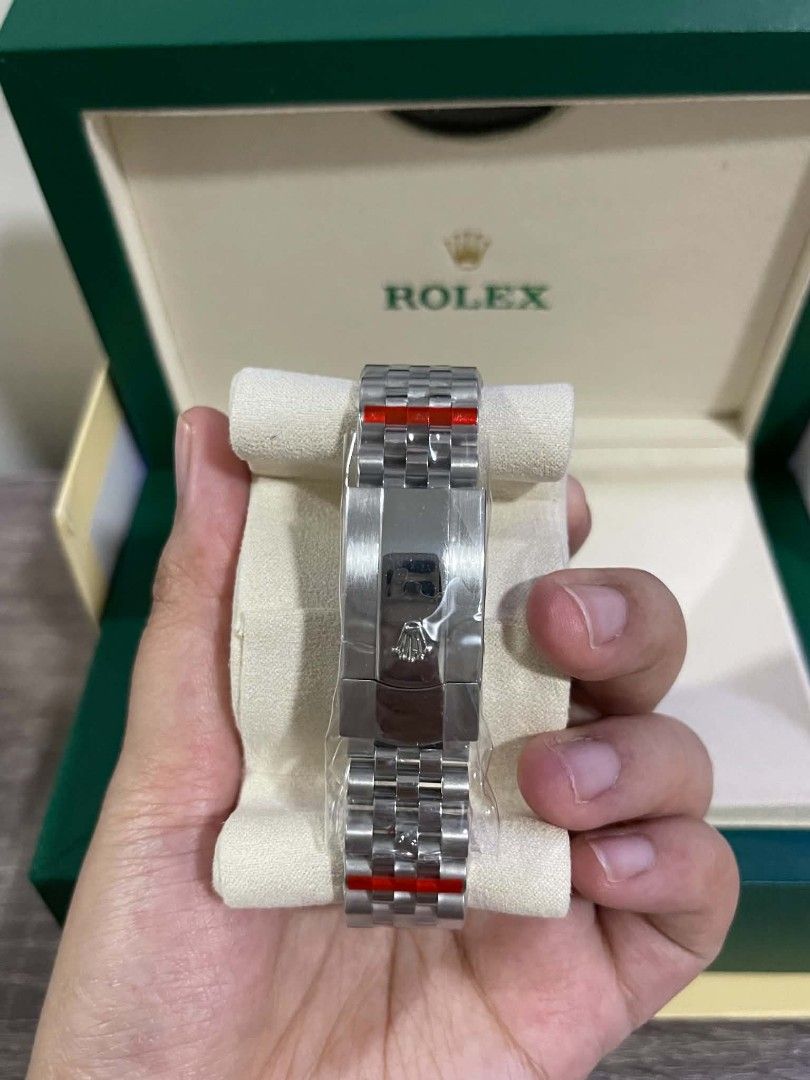 Rx Automatic watch for men 41mm Datejust Silver Dial (Category: Jewelry) located in Calamba. Submitted by gheo0025 (Listing ID 1458684646, Image 3). Description: - Rx Oyster Perpetual Datejust - Elegant silver dial - Classic Jubilee bracelet - Iconic fluted bezel - Reliable automatic movement - Convenient date window at 3 o'clock - Comes with original Rolex box - Versatile for daily wear and special events inclusion box card manual paper bag.