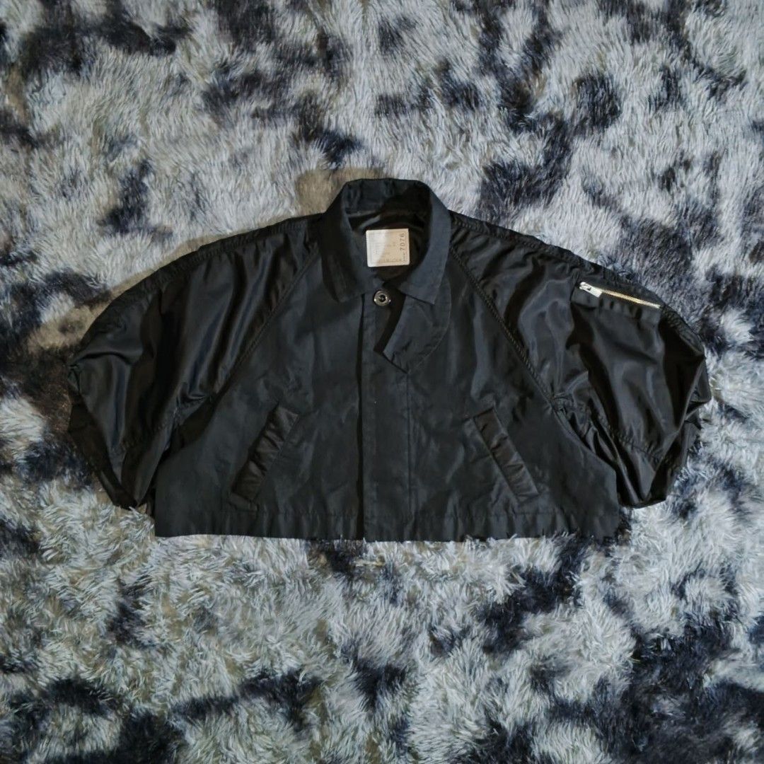 Sacai Black Paneled Jacket (Category: Luxury Apparel) located in Dagupan City. Submitted by finestthriftstuffph (Listing ID 1458593547, Image 3). Description: Padded Cotton-Blend Gabardine And Twill Jacket 'Black' Spread Collar, Button Closure Welt Pockets, Gathering at Raglan Sleeves, Utility Pocket at Sleeve, Vented Side Seams, Bungee-Style Drawstring at Hem Full Cupro Satin Lining Authentic Very Presentable Size: 1 on Tag Actual Measurement (M