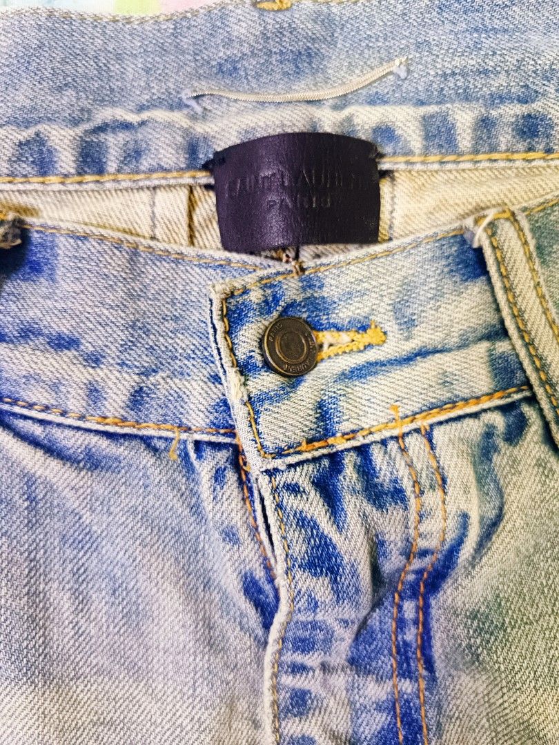 Saint Laurent paris/ripped jeans (Category: Jeans) located in Angeles City. Submitted by al.quilala03 (Listing ID 1458637068, Image 2). Description: size 30 in tag but fit 32 L-39 inches W-18 Hem-6 Rise-10 see pic before buying🙏.