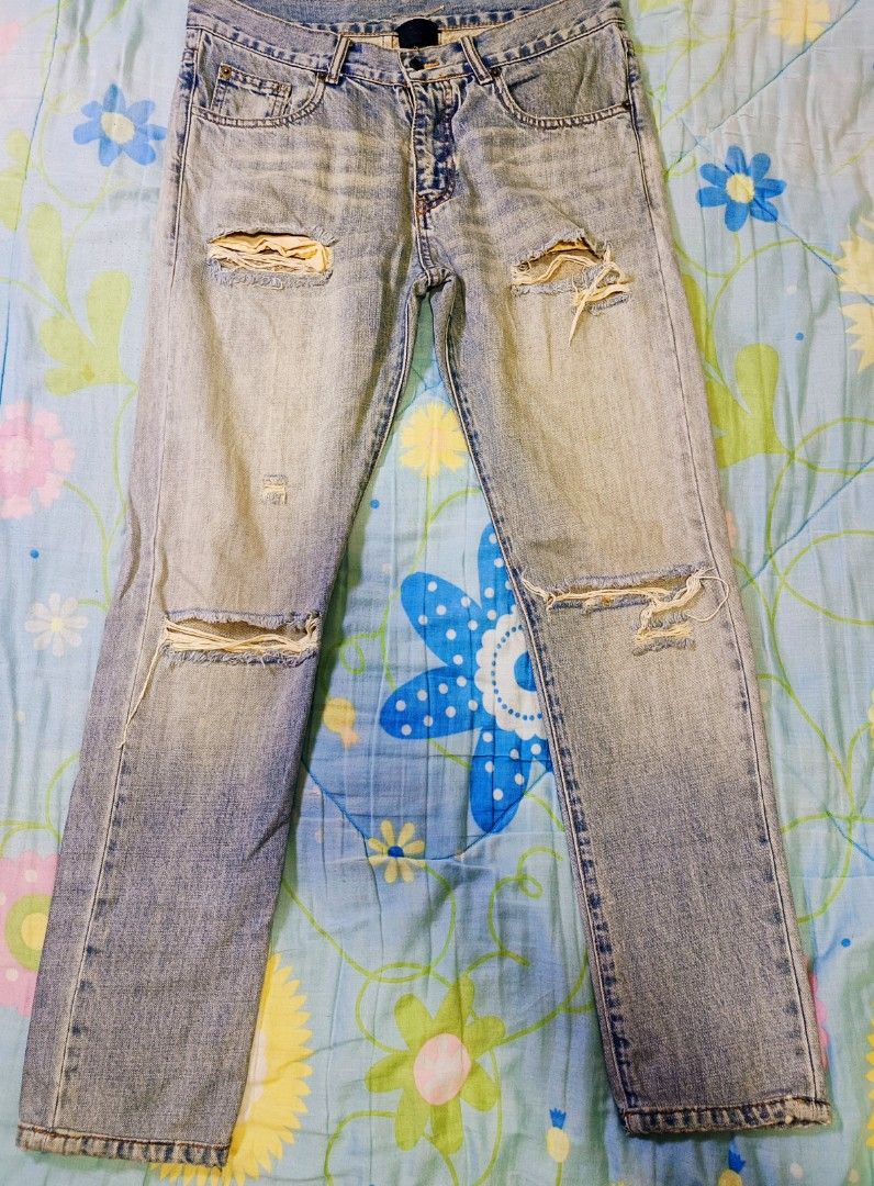 Saint Laurent paris/ripped jeans (Category: Jeans) located in Angeles City. Submitted by al.quilala03 (Listing ID 1458637068, Image 1). Description: size 30 in tag but fit 32 L-39 inches W-18 Hem-6 Rise-10 see pic before buying🙏.