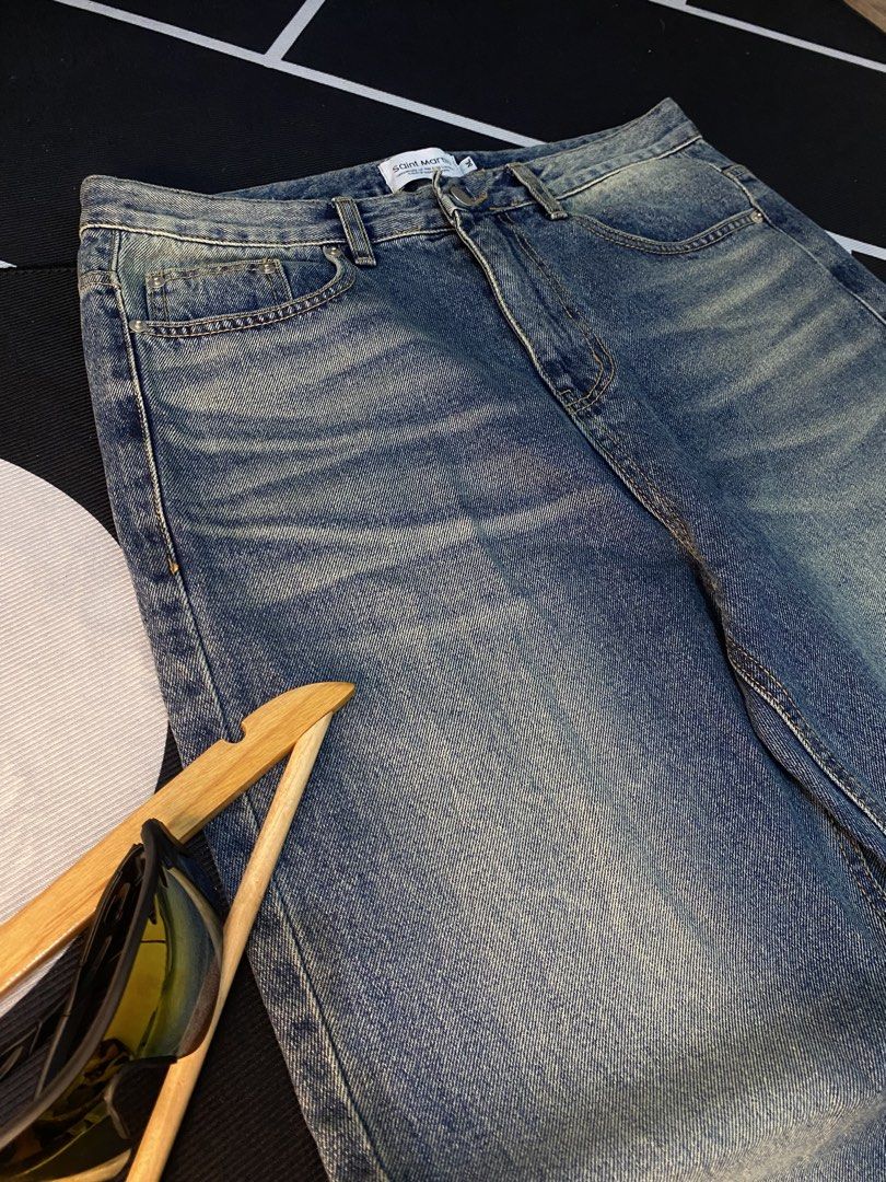 Saint Mort Paris Flared Jeans (Category: Jeans) located in Cateel. Submitted by khan.find_ (Listing ID 1458623317, Image 3). Description: - Saint Mort Paris flared jeans - Classic blue wash with distressed details - High-waisted fit - Wide leg opening for a retro vibe - Button and zip closure - Functional front and back pockets.