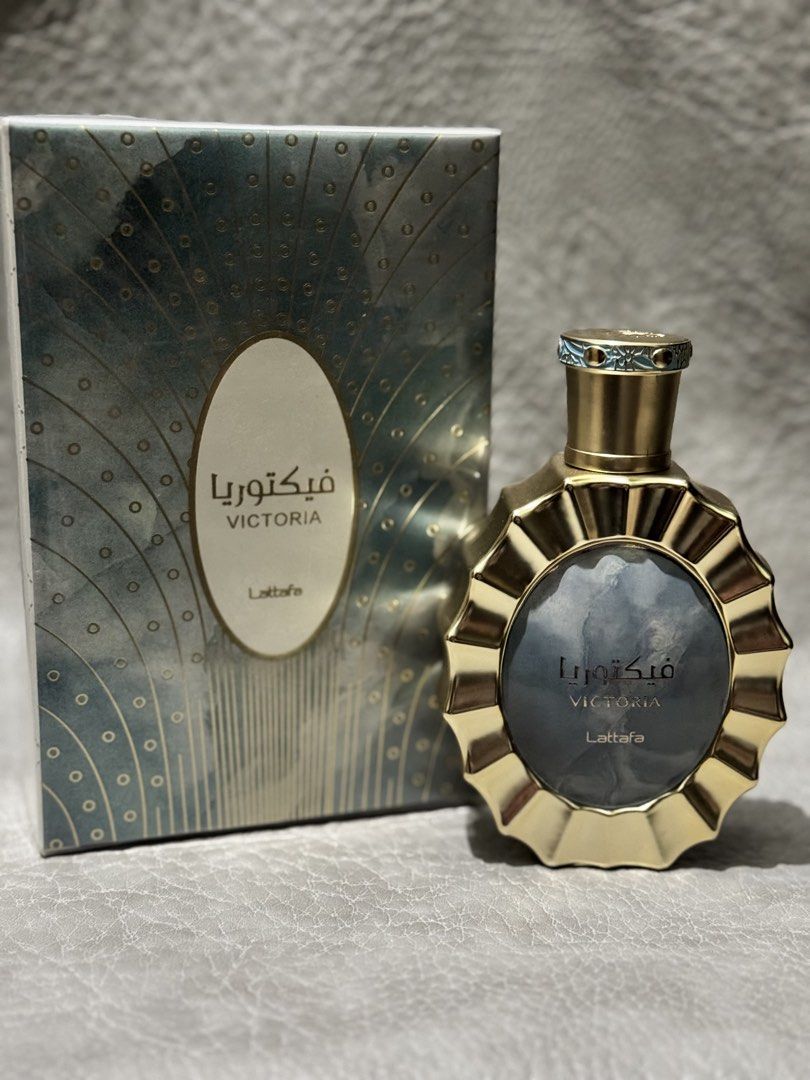 Sale! Lattafa Victoria (Category: Fragrance & Deodorants) located in Quezon City. Submitted by gdpc_ph (Listing ID 1458670595, Image 1). Description: Fragrance Name: Lattafa Victoria Size: 100ML Item Condition: - Almost full condition. Good as new! - Check photo for juice level. - Actual photos posted. - With box. Box in mint condition. Plastic seal still intact. - With sticker label on the bottle. Longevity based on our trial: Moderate to long l