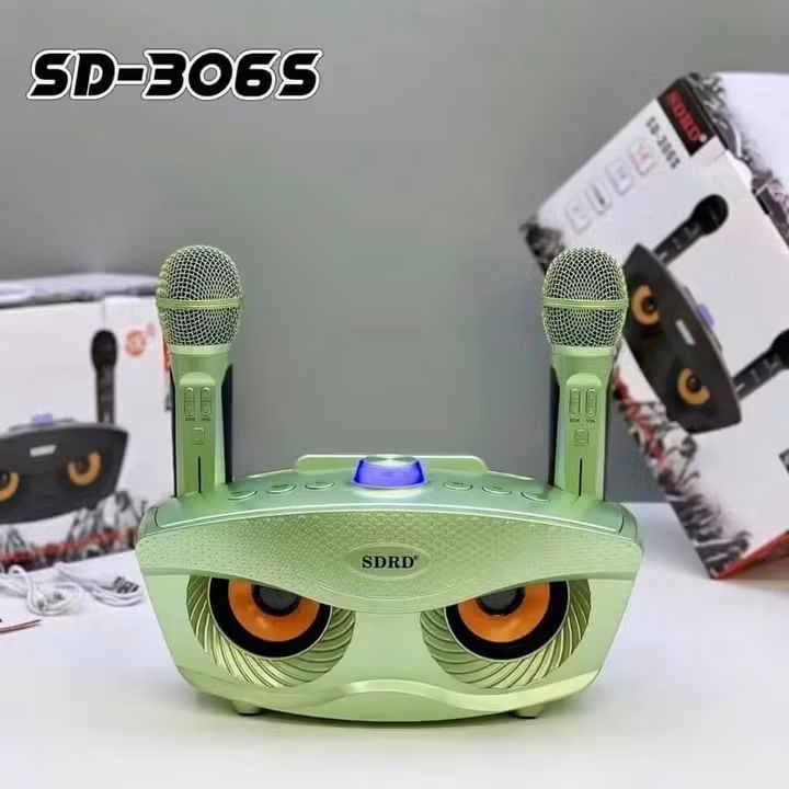 SDRD SD-306S Portable Bluetooth Speaker with Microphones (Category: Soundbars, Speakers & Amplifiers) located in Manila. Submitted by iliasjen3082126 (Listing ID 1458563536, Image 3). Description: - Portable Bluetooth Speaker with 2 Microphones - Wireless connection for KTV on mobile & TV - 360-degree surround sound - Reverb regulation for enhanced vocals - Available colors: Black, Gold, Purple, Green - Perfect for home KTV sessions.