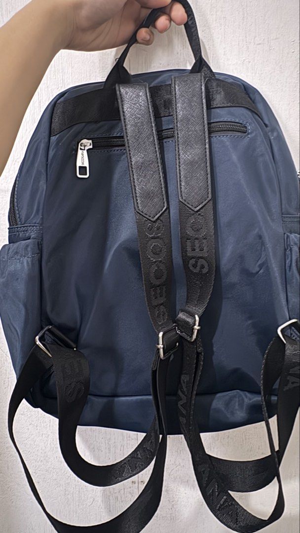 Secosana Navy Blue Quilted Front Nylon Backpack (Category: Backpacks) located in Manila. Submitted by clove127 (Listing ID 1458688886, Image 3). Description: - Price Negotiable! - Size Kasya Tablet/Ipad/ A5 Binder/ Tumbler / Payong - Condi is Like New/ lightly used - Zippers are all working - No stain/tear/scratch - adjustable straps - multiple pockets so oraganized and spacious inside with more zippers and compartment .
