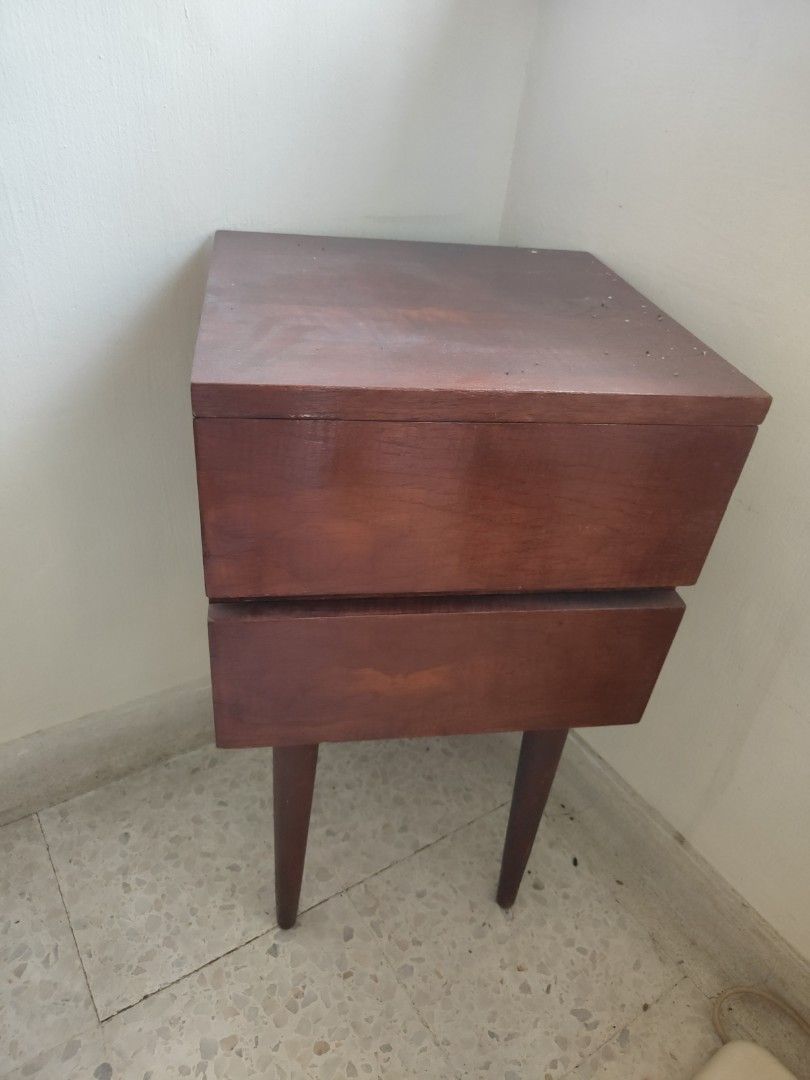 Side table (Category: Tables & Sets) located in Singapore. Submitted by happymountain.584e54 (Listing ID 1458575309, Image 1). Description: - Classic wooden side table - Features tapered legs for a stylish look - Rich wood tone complements various decor - Meetup available at Marsiling Drive.