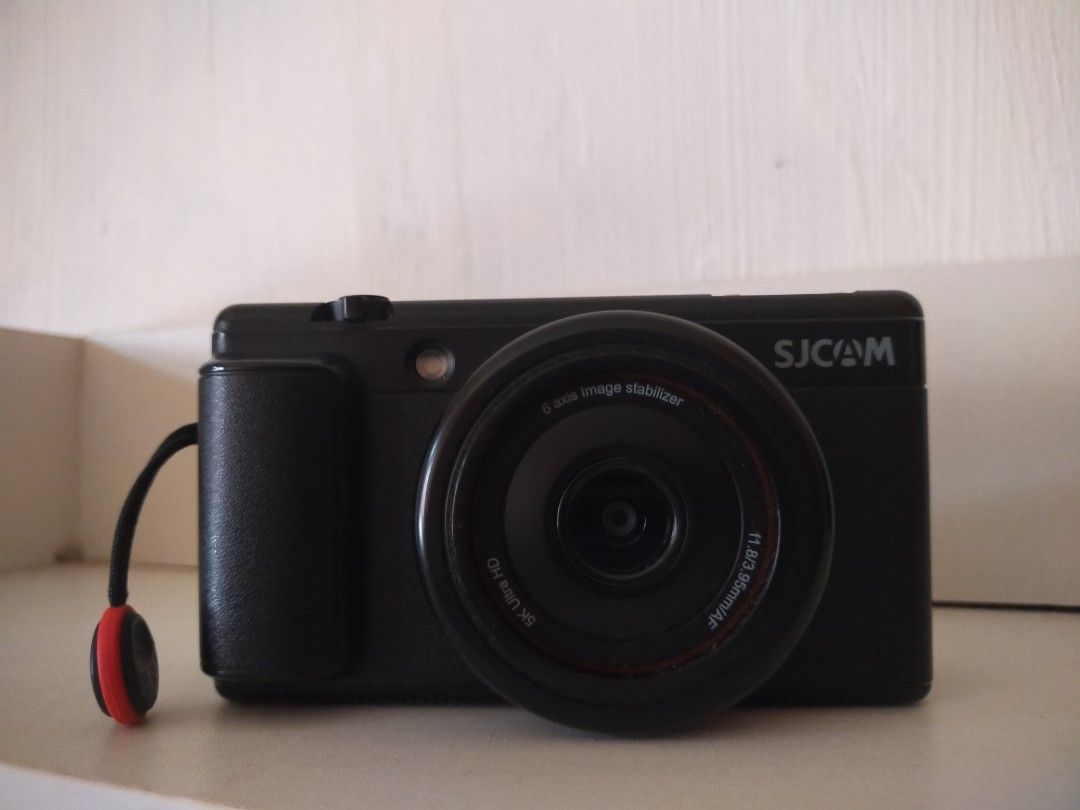 SJCAM 5K Action Camera with 6-Axis Image Stabilizer (Category: Cameras) located in Santo Tomas. Submitted by zenzenzennaya (Listing ID 1458536838, Image 2). Description: - Shoot in crystal-clear 5K resolution - Experience ultra-smooth footage with 6-axis image stabilization - Effortlessly frame your shots using the convenient flip-out screen - Compact and portable design for on-the-go adventures - Perfect for capturing all your exciting moments n