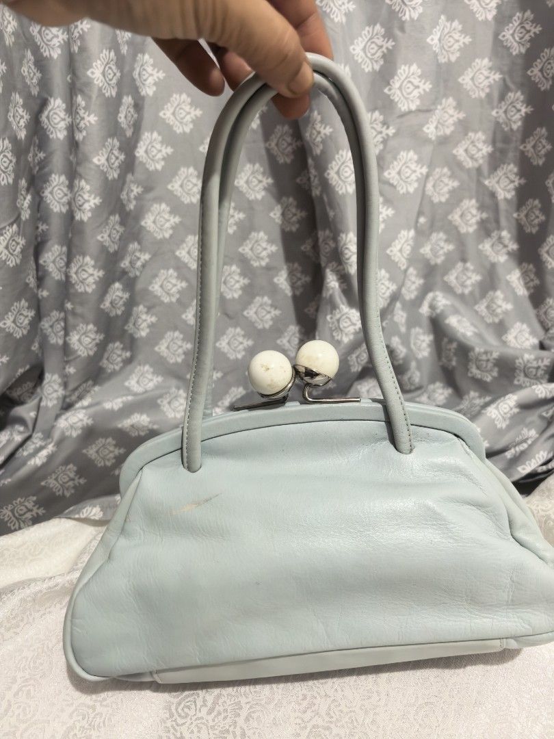 Sky blue Kisslock party bag (Category: Purses & Pouches) located in Tuguegarao City. Submitted by zenphoenix-7ad615 (Listing ID 1458596264, Image 2). Description: Fits cellphone With minimal signs of use Please see pictures 10 by 5.5 inches.