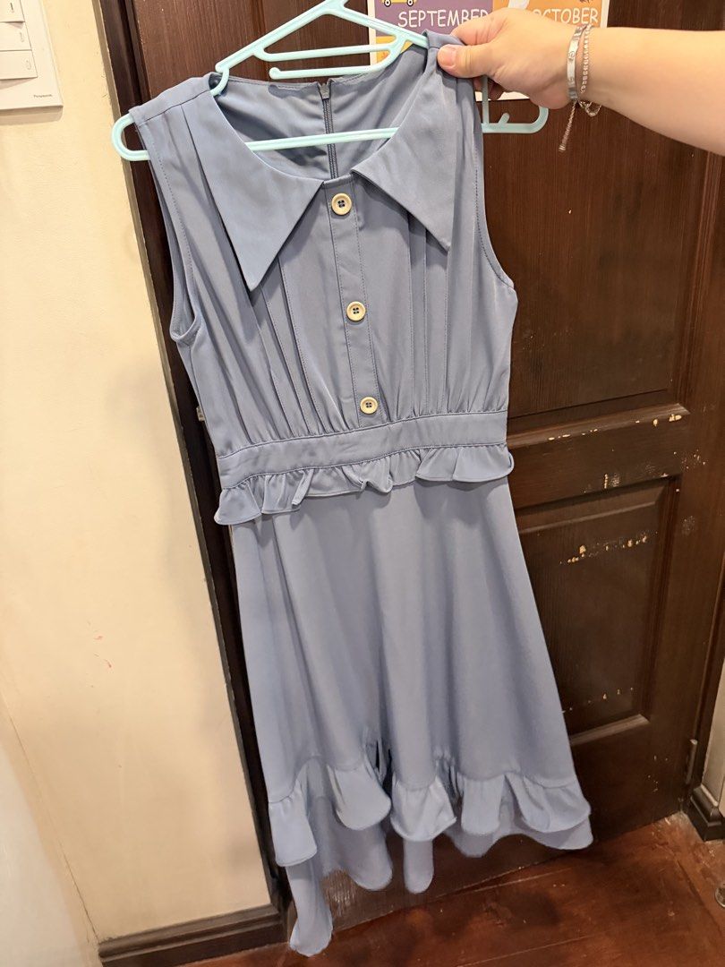 Sleeveless Peter Pan Collar Ruffle Dress (Category: Dresses) located in Manila. Submitted by tabsy (Listing ID 1458659282, Image 1). Description: - Light blue sleeveless dress - Features a charming Peter Pan collar with button details - Elasticated waist for a comfortable fit - Ruffled hemline on the skirt - Convenient back zipper closure - Ideal for casual outings or special events Super nice cloth New just washed. Not used.