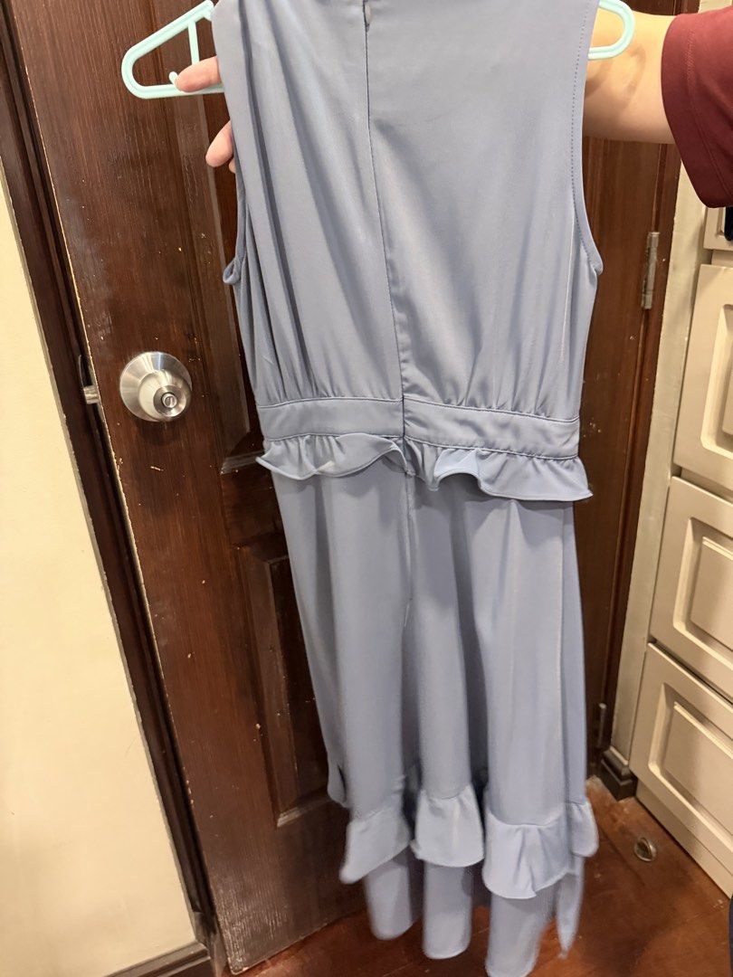 Sleeveless Peter Pan Collar Ruffle Dress (Category: Dresses) located in Manila. Submitted by tabsy (Listing ID 1458659282, Image 2). Description: - Light blue sleeveless dress - Features a charming Peter Pan collar with button details - Elasticated waist for a comfortable fit - Ruffled hemline on the skirt - Convenient back zipper closure - Ideal for casual outings or special events Super nice cloth New just washed. Not used.