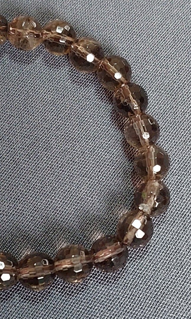 Smoky Quartz Bracelet 8mm (Category: Bracelets) located in Gapan. Submitted by purseofjune (Listing ID 1458507747, Image 3). Description: 16cm, 8mm beads faceted disco ball, sparkly beads.