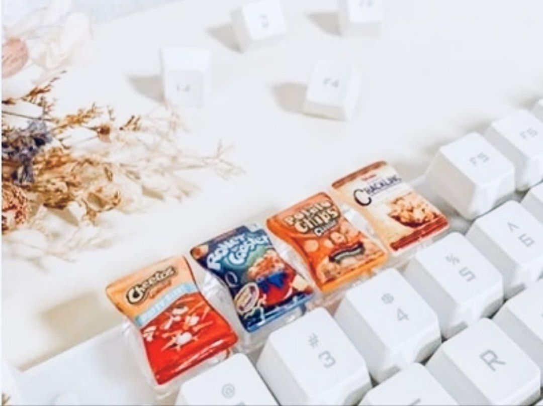 Snack Chips Keycaps for Mechanical Keyboards (Category: Computer Keyboard) located in Paranaque City. Submitted by kenndy.man (Listing ID 1458502085, Image 2). Description: Selling keycap for mechanical keyboards. • Brand new • Compatible with MX-style switches (cross axis) • Great for customization or replacing a keycap • Price: ₱ 50 / each 📍 Location: Paranaque 🚚 Shipping available PM if interested! Thank you! 😊.