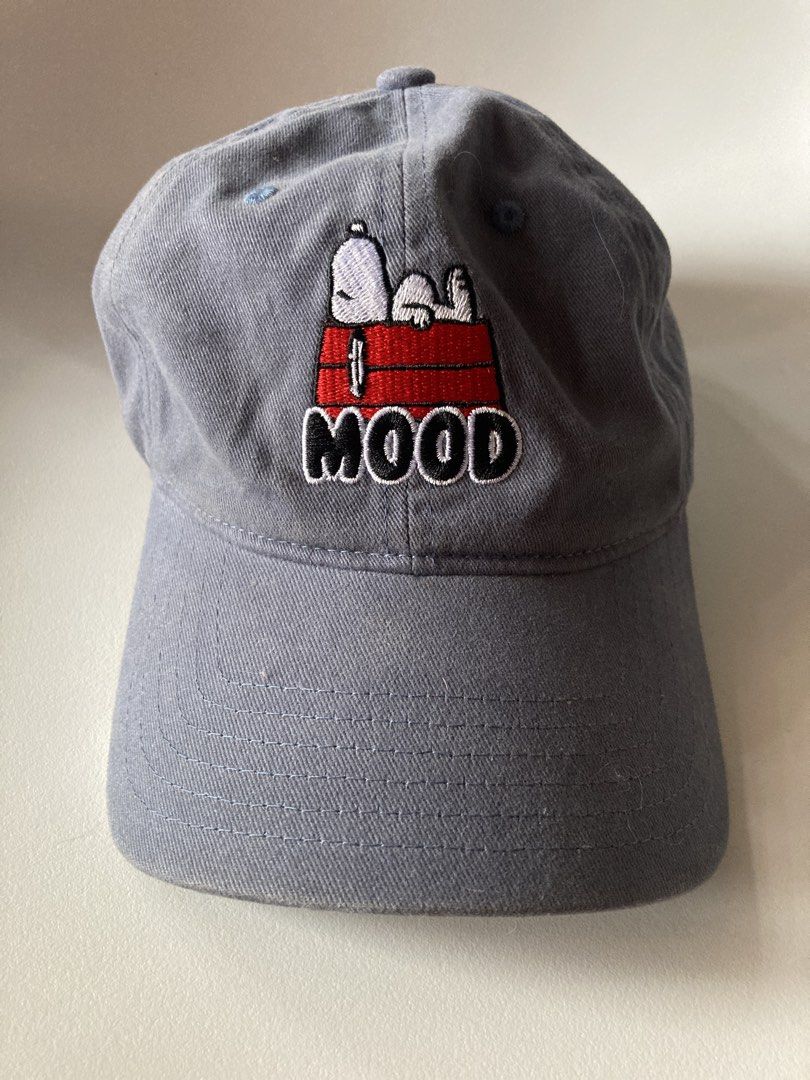 Snoopy Mood Baseball Cap Grey Peanuts (Category: Caps & Hats) located in Antipolo. Submitted by ibskikayshop (Listing ID 1458555734, Image 1). Description: - Grey baseball cap featuring Snoopy and 'MOOD' embroidery. - Adjustable strap with a metal buckle for a custom fit. - Authentic Peanuts branding inside. - Ideal for everyday casual wear..
