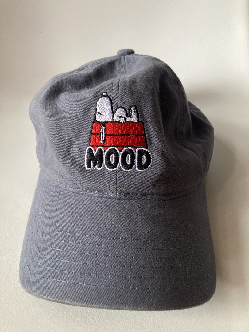 Snoopy Mood Baseball Cap Grey Peanuts (Category: Caps & Hats) located in Antipolo. Submitted by ibskikayshop (Listing ID 1458555734, Image 2). Description: - Grey baseball cap featuring Snoopy and 'MOOD' embroidery. - Adjustable strap with a metal buckle for a custom fit. - Authentic Peanuts branding inside. - Ideal for everyday casual wear..