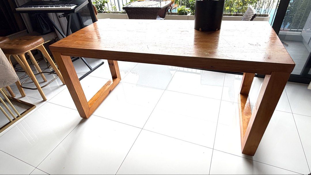 Solid Wooden Table (Category: Tables & Sets) located in Singapore. Submitted by passionsg (Listing ID 1458516694, Image 3). Description: - Solid wood table - Simple, modern design - Perfect for dining or as a workspace - Comfortably seats 6 people - Selling due to relocation - Pickup only.