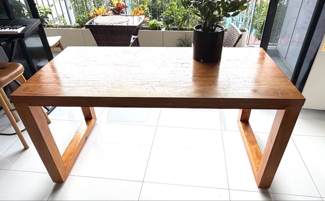 Solid Wooden Table (Category: Tables & Sets) located in Singapore. Submitted by passionsg (Listing ID 1458516694, Image 1). Description: - Solid wood table - Simple, modern design - Perfect for dining or as a workspace - Comfortably seats 6 people - Selling due to relocation - Pickup only.