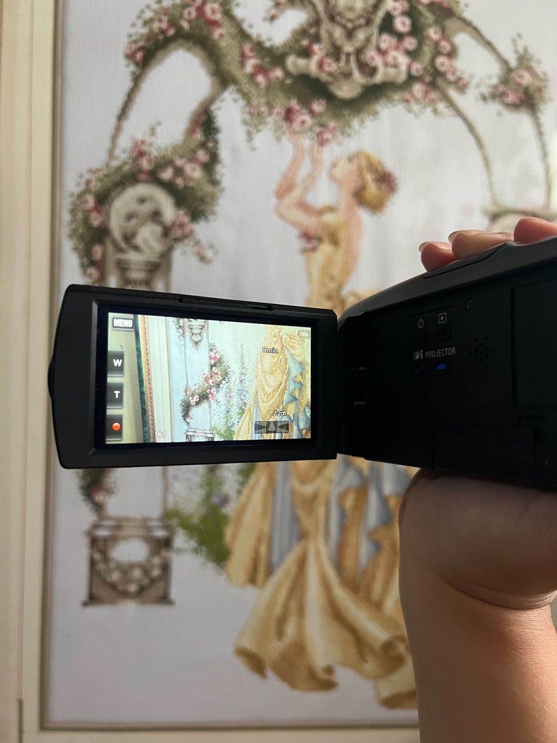 Sony HDR PJ670 (Category: Cameras) located in Manila. Submitted by harrysuey (Listing ID 1458540490, Image 3). Description: NO ISSUE - Black Sony Camcorder - Records in HD with AVCHD Progressive - Built-in projector for easy viewing - Flip-out screen for framing shots - Includes battery - Ideal for capturing and preserving memories.