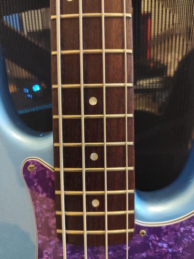 Squier vintage modified 4 string precision jazz bass (Category: Musical Instruments) located in Pasig City. Submitted by akocnicco (Listing ID 1458524537, Image 2). Description: Selling my Squier vintage modified 4 string precision jazz bass Babicz bridge EMG GZR pickups Purple pickguard DR Dragon skin strings installed Selling for 26,000 Pickup in Pasig, Kapitolyo .