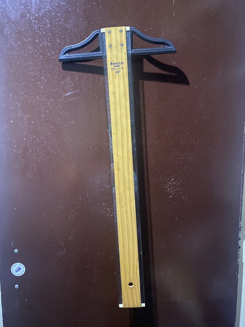 STAEDTLER MARS 24" T-Square Ruler with Case (Category: Stationery & School Supplies) located in Cabuyao City. Submitted by abellaingrid_ (Listing ID 1458666850, Image 2). Description: - Staedtler Mars T-square ruler - 24 inches in length - Wooden blade with a durable plastic head - Includes original blue Staedtler carrying case - Ideal for drafting and drawing precise straight lines - Ruler is in good, pre-owned condition and ready for use.