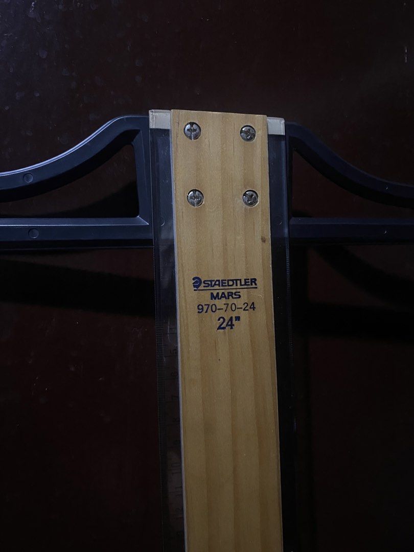 STAEDTLER MARS 24" T-Square Ruler with Case (Category: Stationery & School Supplies) located in Cabuyao City. Submitted by abellaingrid_ (Listing ID 1458666850, Image 1). Description: - Staedtler Mars T-square ruler - 24 inches in length - Wooden blade with a durable plastic head - Includes original blue Staedtler carrying case - Ideal for drafting and drawing precise straight lines - Ruler is in good, pre-owned condition and ready for use.