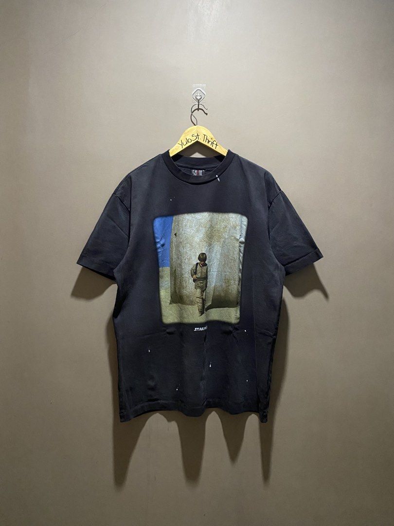 Star Wars (Category: Tshirts & Polo Shirts ) located in Iloilo. Submitted by yulostreet.thrift (Listing ID 1458638378, Image 1). Description: Star Wars by SAINT Size M on tag Complete tags 24Wx28.5L Best fit XL Features a mega print on the front and a statement print on the back, paint stains are part of the design. Vintage fade.