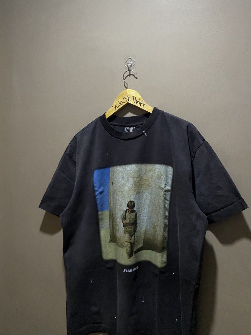 Star Wars (Category: Tshirts & Polo Shirts ) located in Iloilo. Submitted by yulostreet.thrift (Listing ID 1458638378, Image 2). Description: Star Wars by SAINT Size M on tag Complete tags 24Wx28.5L Best fit XL Features a mega print on the front and a statement print on the back, paint stains are part of the design. Vintage fade.