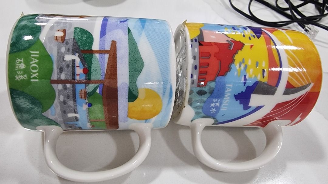 Starbucks Taiwan Landmark Ceramic Mugs (Category: Coffee & Tea Tableware) located in Paranaque City. Submitted by olxph_668280920 (Listing ID 1458642969, Image 1). Description: - 4 unique ceramic mugs. - Each mug features a different Taiwan landmark: Jiaoxi, Tamsui, Kenting, and Sizihwan. - Ideal as a souvenir or for everyday use. - Perfect gift for coffee and tea enthusiasts. price per piece.