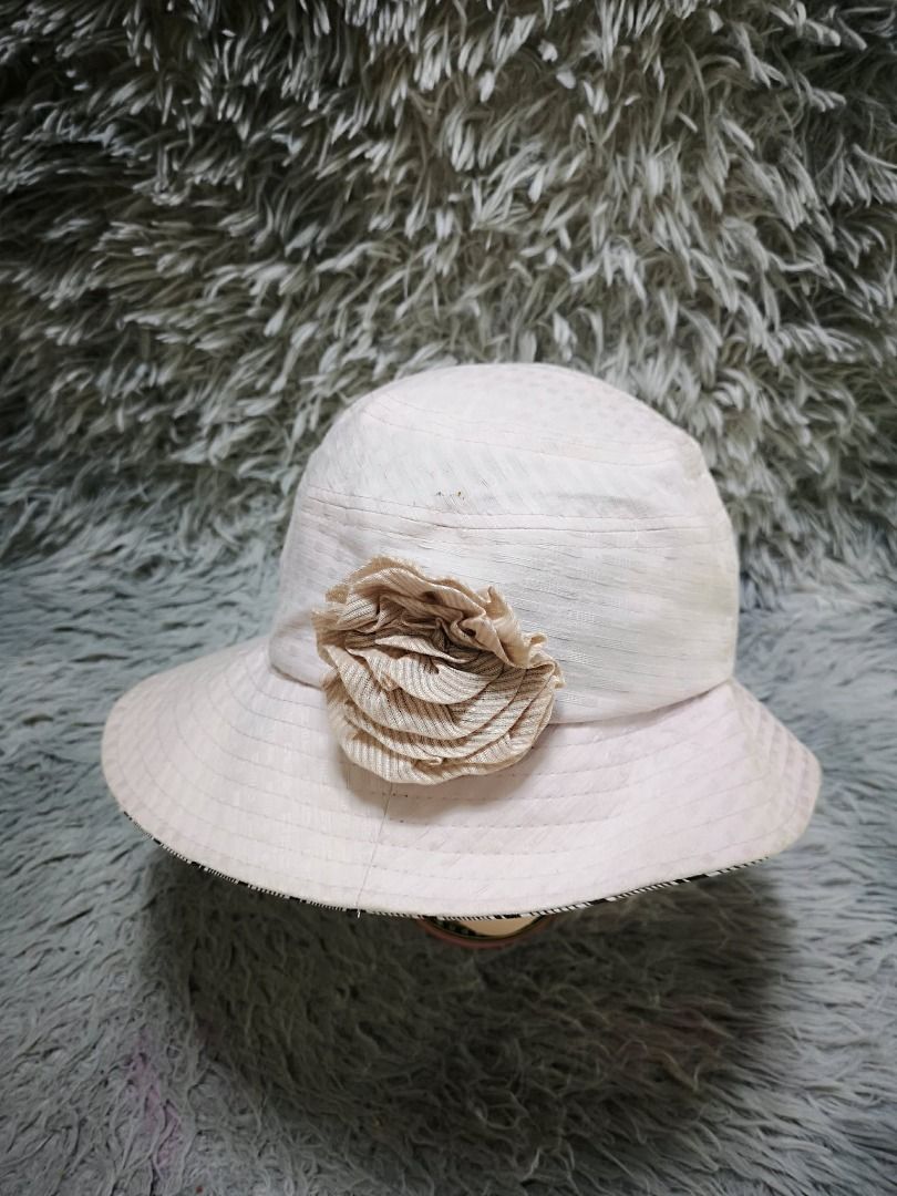 Stripe Floral Bucket Hat (Category: Hats & Beanies) located in Santa Cruz. Submitted by jmy_surplus.2 (Listing ID 1458561340, Image 1). Description: Size ; 57.5cm Color ; Cream Type ; Bucket Hat Brand ; No brand Material ; Fabric Style ; Floral Side Bucket Hat LG 123 JMY 5 Batch #216.