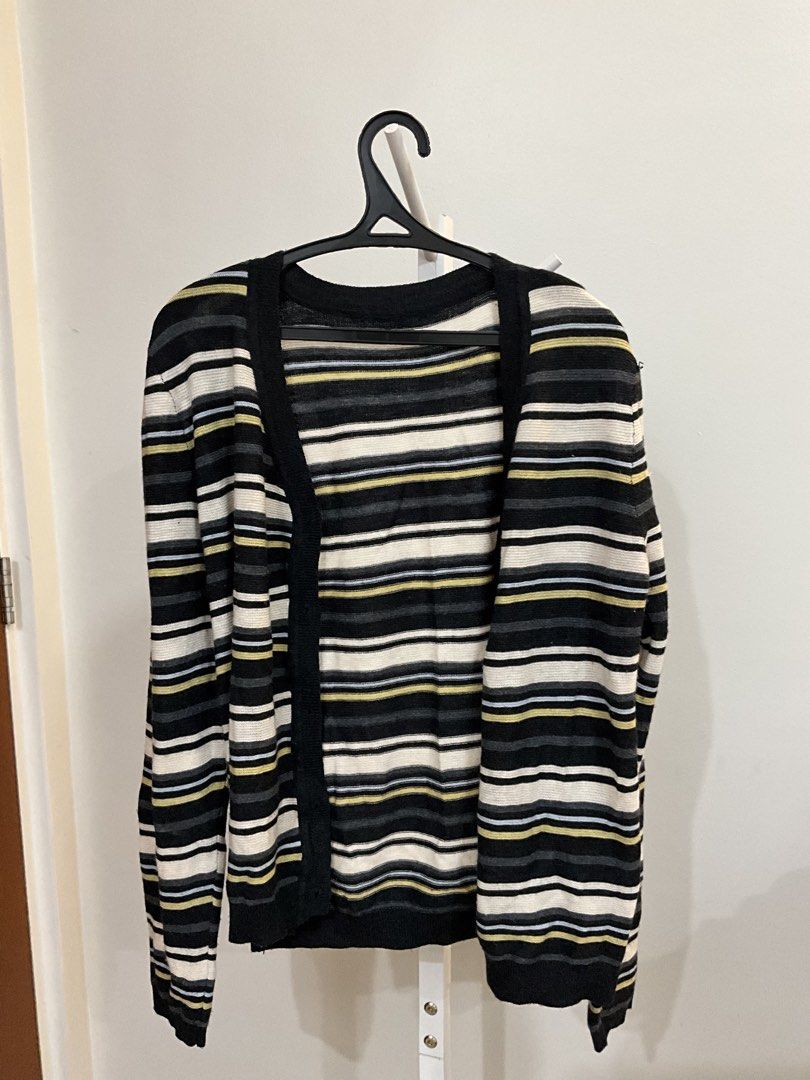 Striped Button-Up Cardigan (Category: Coats, Jackets and Outerwear) located in Manila. Submitted by warm.secondchancefits (Listing ID 1458636185, Image 1). Description: - Chic striped cardigan in black, cream, grey, and yellow. - Features long sleeves and a classic button-up front. - Made from soft, comfortable knit material. - Versatile layering piece for any occasion. - Pairs perfectly with jeans or can be dressed up..