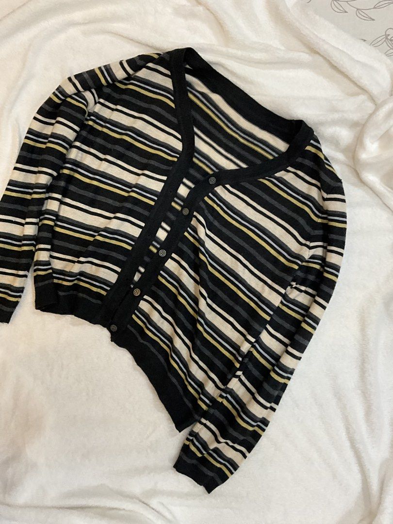 Striped Button-Up Cardigan (Category: Coats, Jackets and Outerwear) located in Manila. Submitted by warm.secondchancefits (Listing ID 1458636185, Image 3). Description: - Chic striped cardigan in black, cream, grey, and yellow. - Features long sleeves and a classic button-up front. - Made from soft, comfortable knit material. - Versatile layering piece for any occasion. - Pairs perfectly with jeans or can be dressed up..