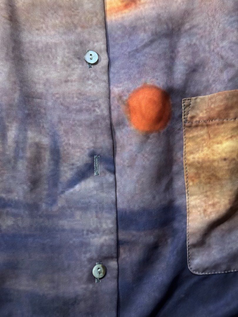 Sunset Print Button-Up Shirt (Category: Tshirts & Polo Shirts ) located in Caloocan City. Submitted by poch.queue (Listing ID 1458547290, Image 3). Description: - Oversize button-up shirt with sunset design - Convenient chest pocket - Missing one button - Fits Medium for Men.