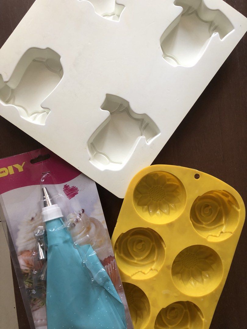 Take All Silicone Molds for Baking & Cake Decorating Set (Category: Bakeware) located in Pasig City. Submitted by vintagely (Listing ID 1458538693, Image 1). Description: - Complete Baking & Decorating Set - Includes silicone molds: baby onesie shape & flower/rose shapes - Comes with a piping bag and various nozzles for detailed decorating - Ideal for cakes, chocolates, soaps, and other DIY projects - Unleash your creativity with fun and easy cra