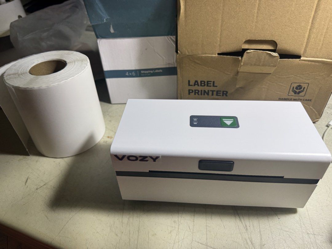 Thermal Label printer with 4x6 shipping labels (Category: Printers, Scanners & Copiers) located in Valenzuela. Submitted by katzstore.ph (Listing ID 1458512781, Image 1). Description: VOZY THERMAL LABEL PRINTER for USB - used for only one month (like new) - include a6 shipping label - include user manual RFS : for decluttering .