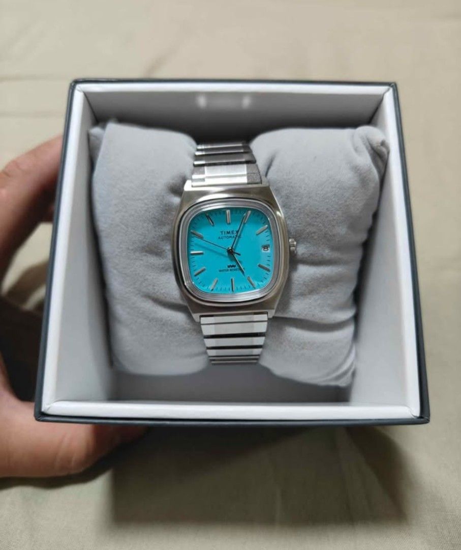 Timex E-Line 1983 Automatic Watch - Turquoise Dial (Category: Men's Watches) located in Caloocan City. Submitted by crib_of_good_deals (Listing ID 1458648920, Image 1). Description: - Cool Timex automatic watch - Striking bright turquoise dial - Durable stainless steel bracelet - Convenient date window - Comes with original box - Ideal for everyday wear or as a statement piece.