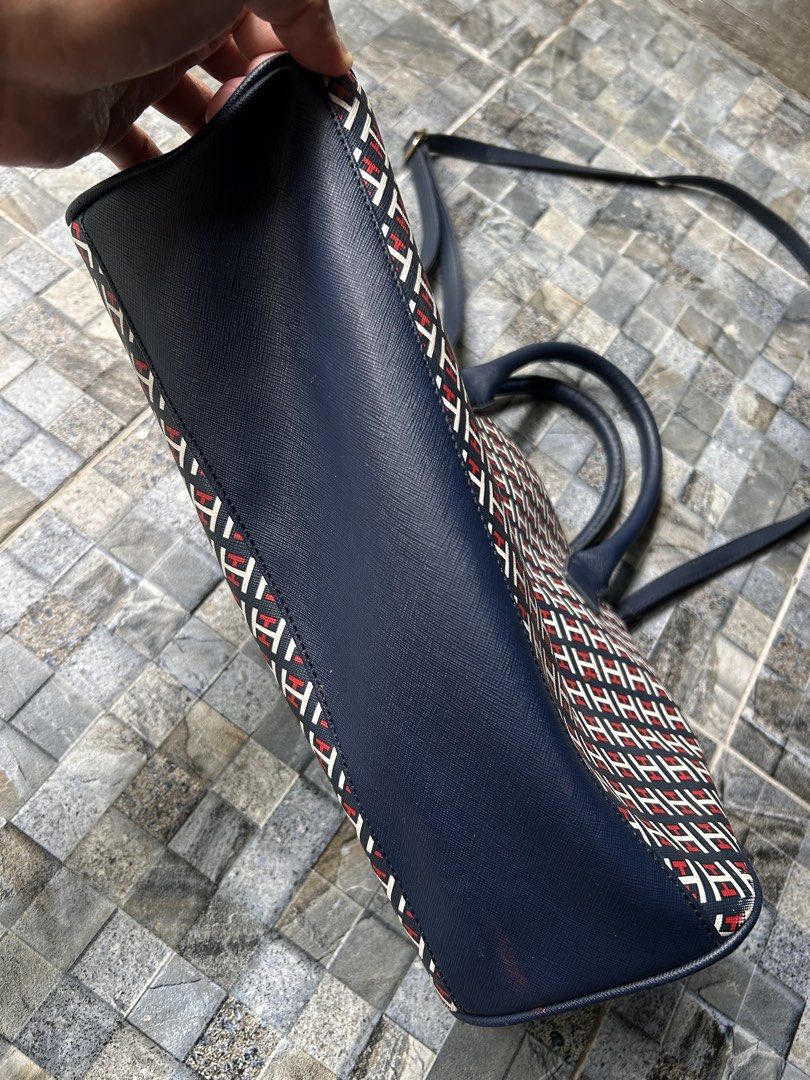 Tommy Hilfiger Monogram Dome Satchel Bag (Category: Cross-body Bags) located in Quezon City. Submitted by commonwealthpickerph (Listing ID 1458529090, Image 2). Description: Tommy Hilfiger Monogram Dome Satchel Bag - The typical dimensions for this specific medium-to-large dome satchel model are: - Length / Width: 11.5 to 13 inches (approx. 29 to 32 cm) - Height: 8.5 to 9.5 inches (approx. 21 to 24 cm) - Depth / Thickness: 5 inches (approx. 13 cm