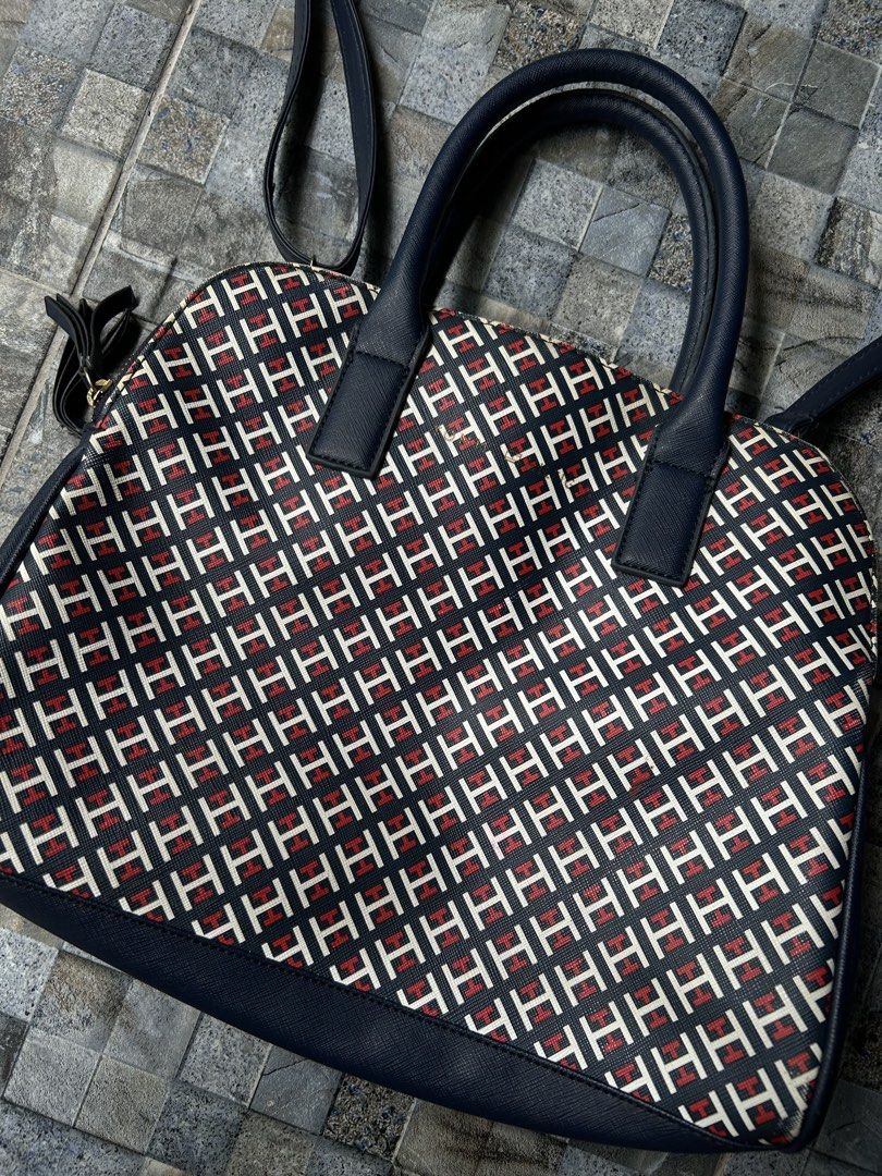 Tommy Hilfiger Monogram Dome Satchel Bag (Category: Cross-body Bags) located in Quezon City. Submitted by commonwealthpickerph (Listing ID 1458529090, Image 3). Description: Tommy Hilfiger Monogram Dome Satchel Bag - The typical dimensions for this specific medium-to-large dome satchel model are: - Length / Width: 11.5 to 13 inches (approx. 29 to 32 cm) - Height: 8.5 to 9.5 inches (approx. 21 to 24 cm) - Depth / Thickness: 5 inches (approx. 13 cm