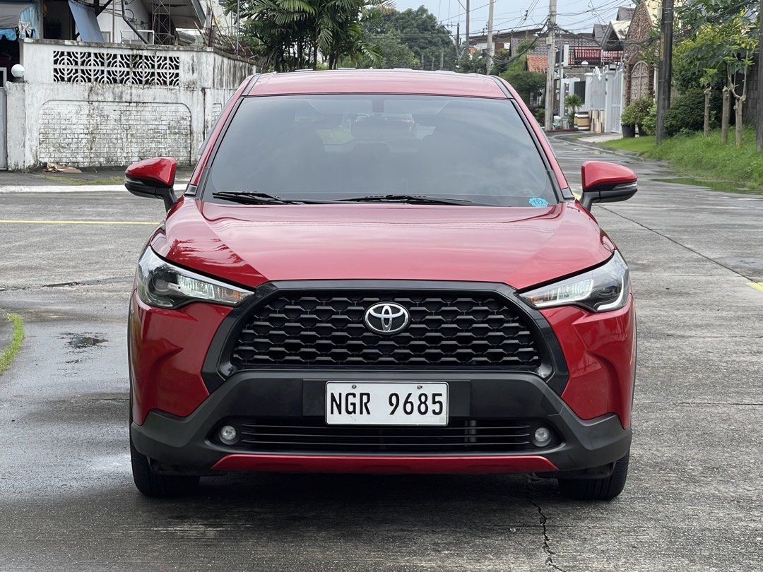 Toyota Corolla Cross 1.8G Auto (Category: Used Cars) located in Angeles City. Submitted by danrsq (Listing ID 1458680319, Image 2). Description: 2021 Toyota Corolla Cross 1.8 G CVT (Gasoline) Red Mica | 27k KM | Complete CASA Records Not flooded 100% Clean Papers / Updated LTO Registration / No encumbrances 2 keys Runs and drives like new Location: Angeles near Clark, Pampanga Serious buyers only, please negotiate upon viewing :) .