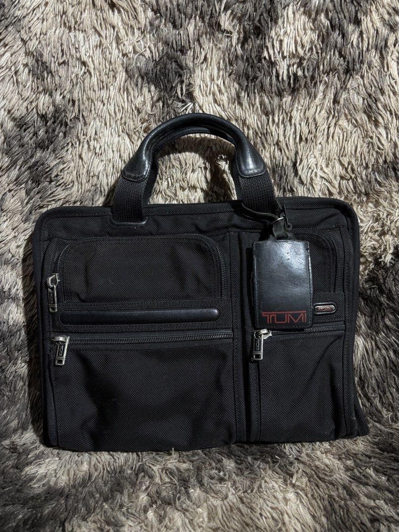 TUMI ALPHA BALLISTIC EXPANDABLE BRIEFCASE/LAPTOP BAG (Category: Briefcases) located in Valenzuela. Submitted by secret_closet_ph (Listing ID 1458660773, Image 2). Description: TUMI ALPHA BALLISTIC EXPANDABLE BRIEFCASE/LAPTOP BAG AUTHENTIC RANK A-AB 9/10 CONDITION SIGN OF USE, STILL PRESENTABLE 3,500 PESOS.