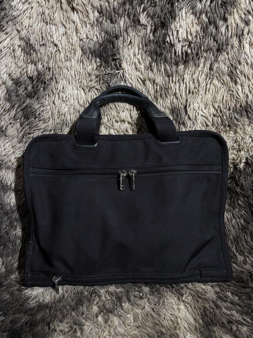 TUMI ALPHA BALLISTIC EXPANDABLE BRIEFCASE/LAPTOP BAG (Category: Briefcases) located in Valenzuela. Submitted by secret_closet_ph (Listing ID 1458660773, Image 3). Description: TUMI ALPHA BALLISTIC EXPANDABLE BRIEFCASE/LAPTOP BAG AUTHENTIC RANK A-AB 9/10 CONDITION SIGN OF USE, STILL PRESENTABLE 3,500 PESOS.
