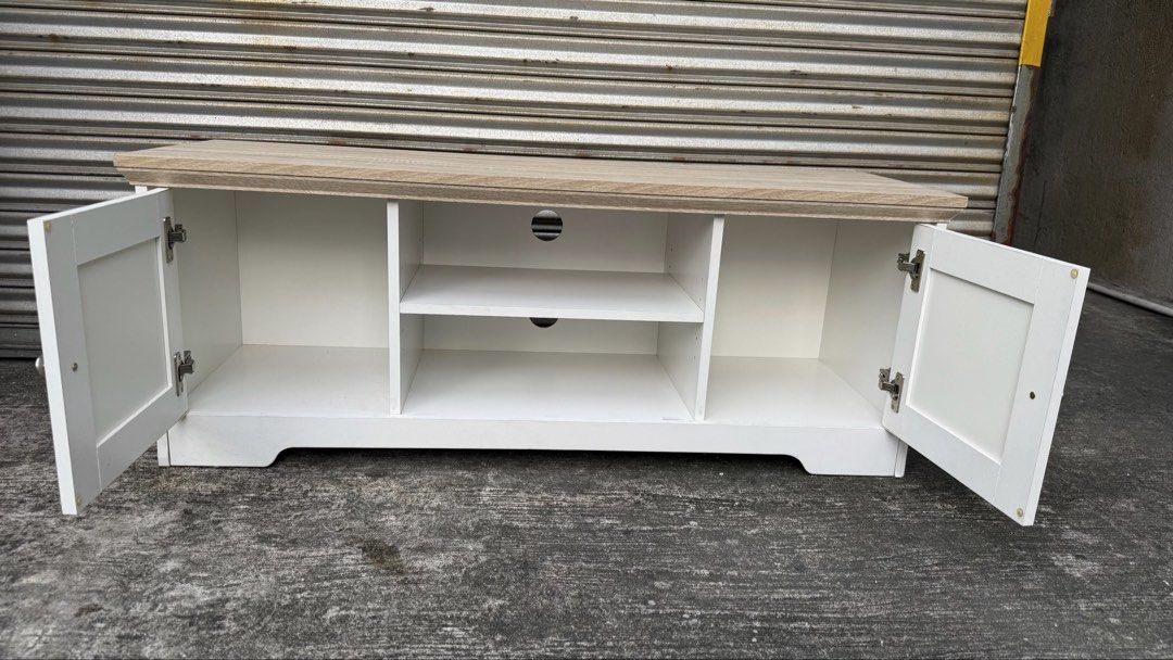 TV Console for Sale! (Category: Other Home Furniture) located in Manila. Submitted by lorrainebungay (Listing ID 1458657634, Image 2). Description: 💰 Was ₱5,000 → Now ₱4,000 📏 118L × 45H × 39W cm ✨ Classic white finish + spacious storage ⚠️ May have minor cosmetic issues/marks due to mall display. Please manage expectations. 📍 Pasig City 🚚 Lalamove available 💳 BPI Bank Transfer Serious buyers only. Message to reserve!.