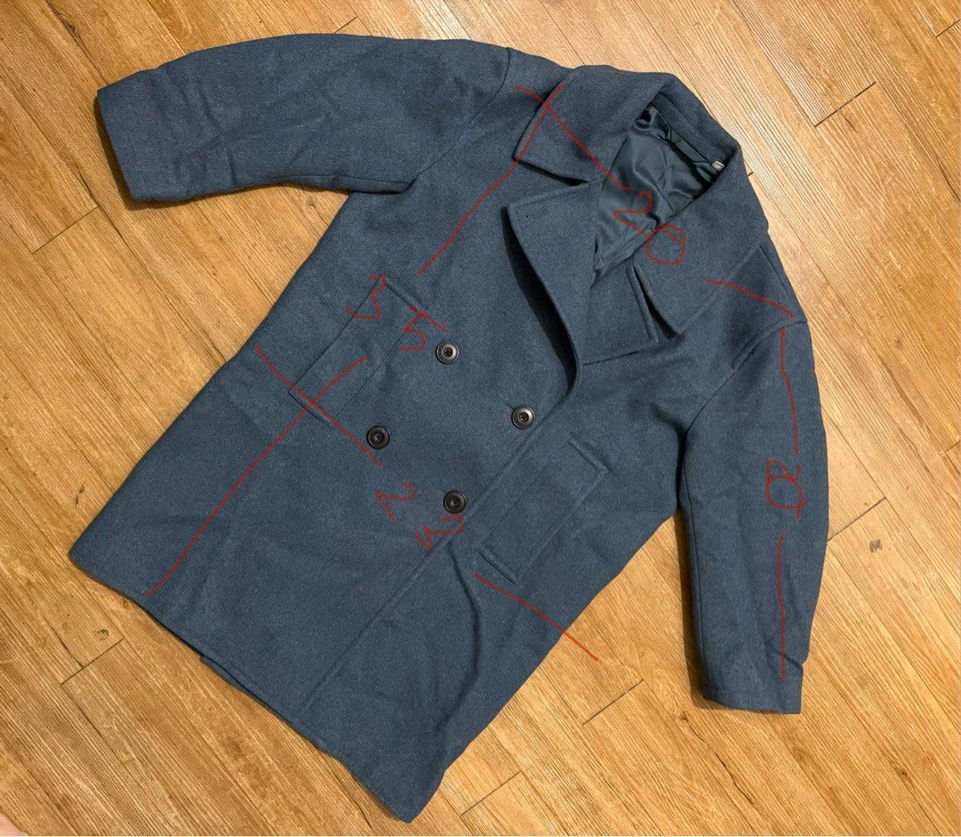 Uniqlo Grey Double-Breasted Wool Blend Coat (Category: Coats, Jackets and Outerwear) located in Marikina City. Submitted by jyus21 (Listing ID 1458537691, Image 1). Description: Size: Small (runs big best fit Medium) Measurements on photo are all in Inches. Blue teal color in actual Location: Marikina Shipping: j&t or Lalamove/Grab for same day delivery within Metro Manila.