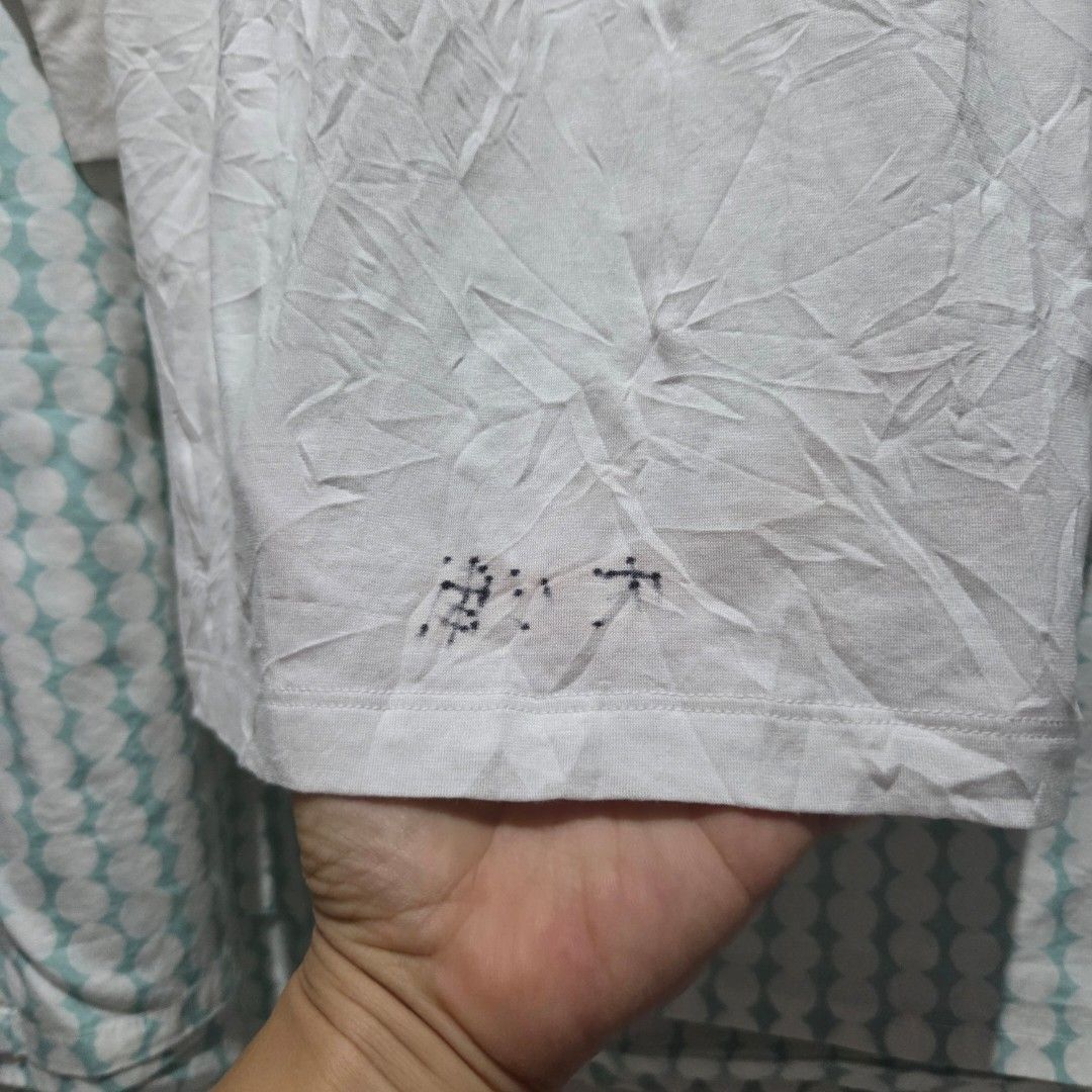 UNIQLO MEN HEATTECH (Category: Coats, Jackets and Outerwear) located in Santiago. Submitted by fromboxes (Listing ID 1458502977, Image 3). Description: Like new but with issue at the back Ships thru J&T Isabela North Luzon Shipping Nationwide No rush shipping 😊😊.