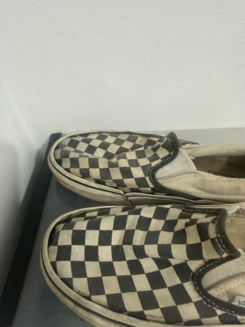 Vans Checkerboard Slip-On Sneakers (Category: Sneakers) located in Cainta. Submitted by lmadzz (Listing ID 1458573457, Image 2). Description: - Classic Vans checkerboard slip-on sneakers - Iconic white and black checkered pattern - Features elastic side accents for easy on and off - Ideal for casual outings and everyday style.
