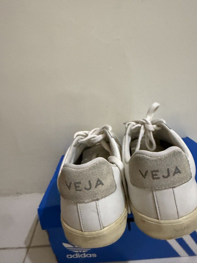 Veja White Leather Sneakers (Category: Sneakers) located in Manila. Submitted by mslxs (Listing ID 1458605400, Image 3). Description: - White leather Veja sneakers - Classic low-top style - White laces - VEJA logo on the back heel - Ideal for casual wear -No box (Left in the province) -Seldom used. Stored already.