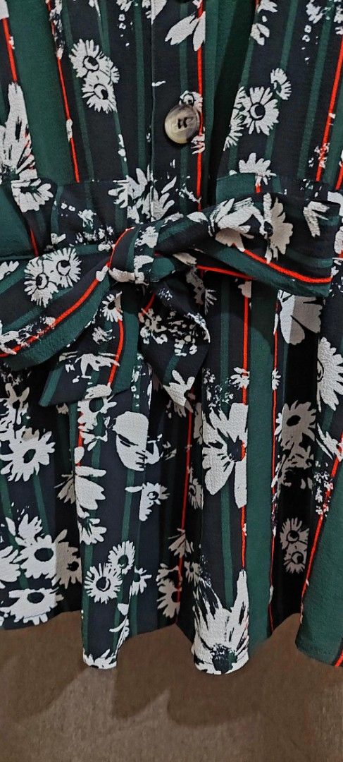 Vero Moda Floral Striped Button-Up Blouse (Category: Blouses) located in Makati City. Submitted by heinzly (Listing ID 1458550822, Image 1). Description: - Dark floral print blouse - Features green and red stripes - V-neckline with button-up front - Cinched waist with tie-front detail bought in debenhams - Long sleeves - Versatile: pairs well with jeans or trousers.