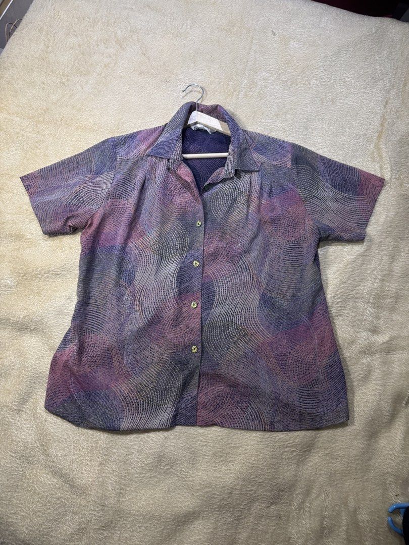Vintage Psychedelic Print Short Sleeve Button Shirt (Category: Blouses) located in Caloocan City. Submitted by poch.queue (Listing ID 1458543972, Image 1). Description: - Collared neckline, Button-up front - Slightly cropped - Loose, comfortable fit.